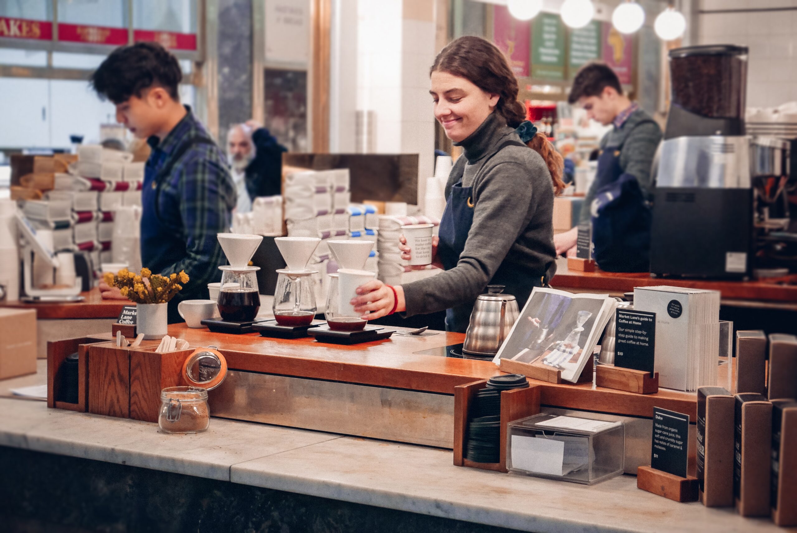 Guests enjoying coffee and conversation at a Melbourne cafe near South Yarra Stays
