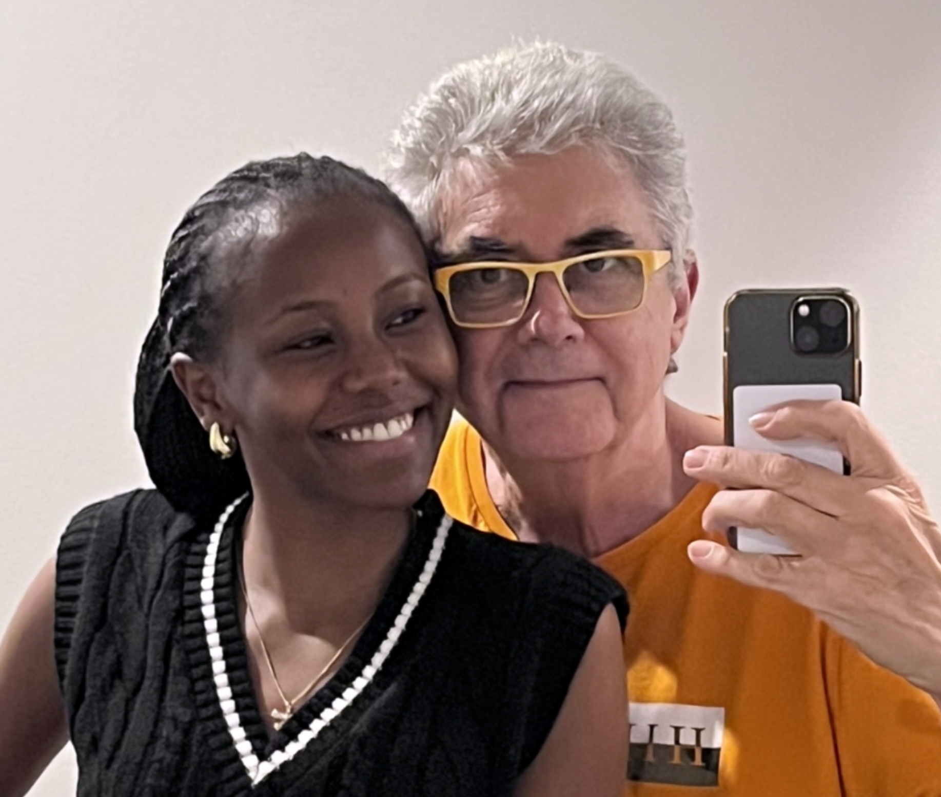 Gary and Blessing, hosts of South Yarra Stays in Melbourne, welcoming guests with genuine hospitality.
